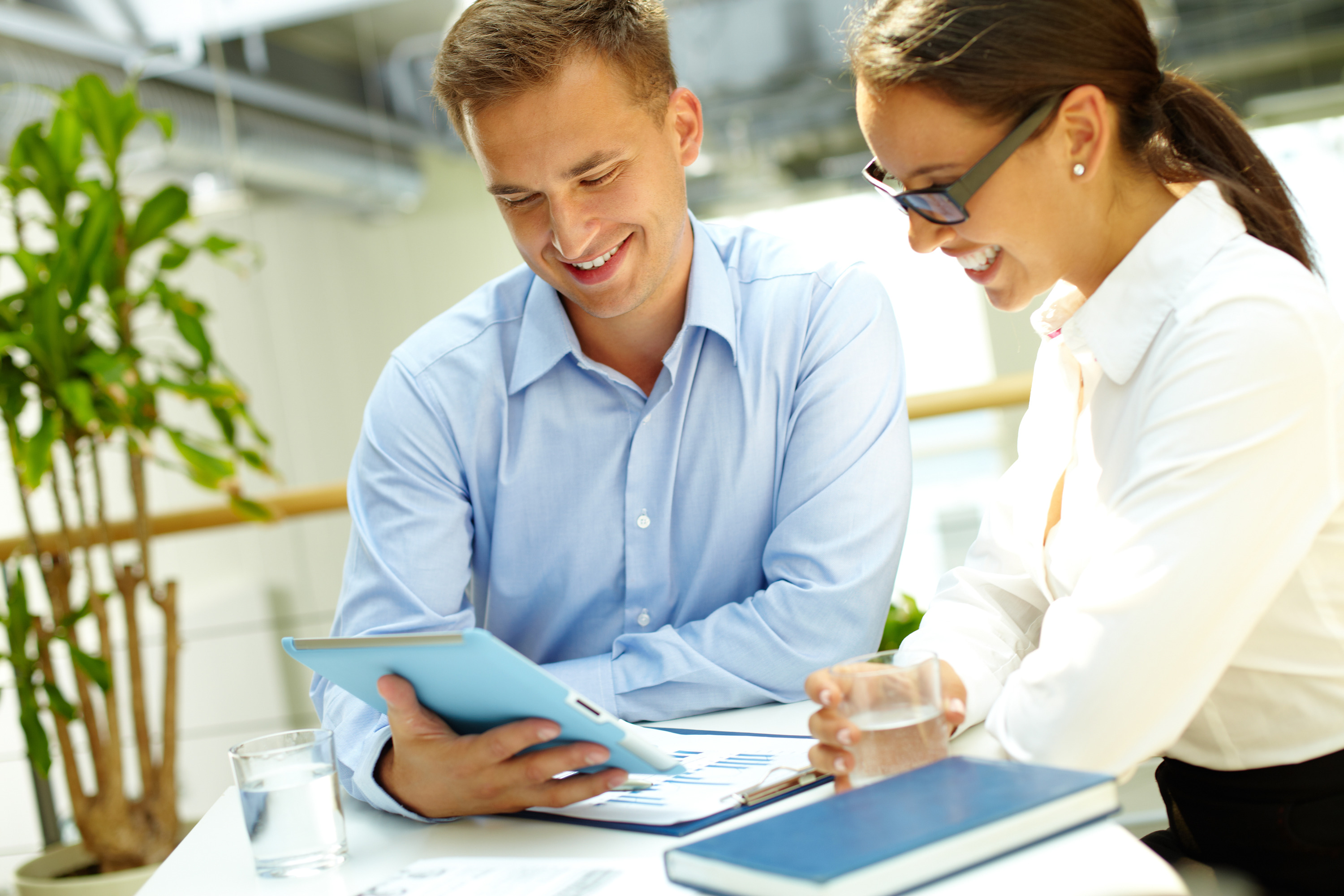 Lovely business team Image of a happy business team enjoying the results of their work