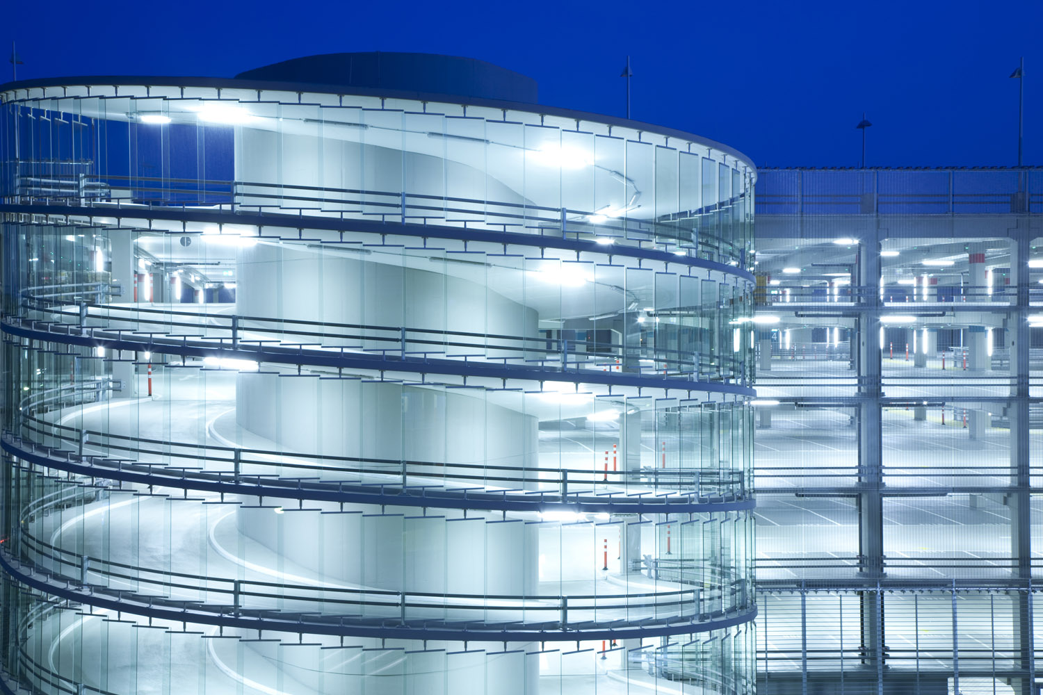 Spiral Ramp And Multi Storey Car Park Illuminated At Night